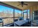 Screened porch with outdoor dining set and wooded views at 3976 Stadler Ne Dr, Conover, NC 28613