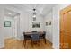 Elegant dining room featuring a wood table and four chairs at 401 N Church St # 507, Charlotte, NC 28202