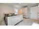 Simple bedroom with light-toned sleigh bed and wardrobe at 525 Grandiflora Ave # 101, Lancaster, SC 29720
