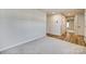 Carpeted hallway with light gray walls and doors to other rooms at 525 Grandiflora Ave # 101, Lancaster, SC 29720