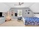 Bedroom with a ceiling fan and window at 7918 Ridgeview Dr, Sherrills Ford, NC 28673