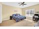 Comfortable bedroom with ample natural light and carpet flooring at 7918 Ridgeview Dr, Sherrills Ford, NC 28673