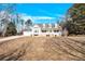 Two-story house with a wraparound porch and stone accents at 7918 Ridgeview Dr, Sherrills Ford, NC 28673