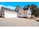 View of home featuring attached garage and ample parking space at 7918 Ridgeview Dr, Sherrills Ford, NC 28673