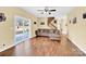 Bright living room with sliding glass doors and staircase at 7918 Ridgeview Dr, Sherrills Ford, NC 28673