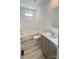 Well-lit bathroom with vanity, modern sink, toilet and shower-tub combo in a neutral color scheme at 819 Wellwood Ave, Statesville, NC 28677