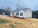 Charming single story home with light siding, complemented by a well-maintained front yard at 819 Wellwood Ave, Statesville, NC 28677