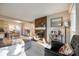 Bright living room with fireplace, dining area, and French doors at 8620 Kirchenbaum Dr, Charlotte, NC 28210