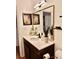 Elegant bathroom with a floating vanity, sleek fixtures, and a large mirror at 8838 Hunter Ridge Dr, Charlotte, NC 28226