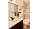 Modern bathroom with a soaking tub, stylish tilework, and updated fixtures at 8838 Hunter Ridge Dr, Charlotte, NC 28226