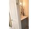 Small bathroom with a vanity and geometric patterned wall at 8838 Hunter Ridge Dr, Charlotte, NC 28226