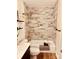 Clean bathroom with a tub/shower combo, updated fixtures, and wood-look tile at 8838 Hunter Ridge Dr, Charlotte, NC 28226