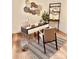 Modern home office features a spacious desk, comfortable chair, and stylish wall art at 8838 Hunter Ridge Dr, Charlotte, NC 28226