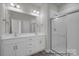 Bathroom with double vanity, and a large walk-in shower at 1104 Verdigris Dr, Gastonia, NC 28054