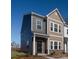 Modern two-story townhome showcasing gray and beige exterior at 1104 Verdigris Dr # 803/0803, Gastonia, NC 28054