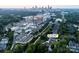 Aerial view of a neighborhood in Charlotte, NC, near a medical facility and the city skyline at 1214 S Kings Dr # A, Charlotte, NC 28207