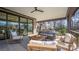 Covered patio with seating area and view of backyard at 1214 S Kings Dr # A, Charlotte, NC 28207