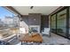 Outdoor patio with fireplace, seating area, and view of the city at 1214 S Kings Dr # A, Charlotte, NC 28207