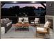 Inviting outdoor patio with comfortable seating, perfect for enjoying evenings with stunning treetop views at 1214 S Kings Dr # A, Charlotte, NC 28207