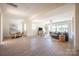 Spacious basement with living area, dining space, and access to backyard at 1214 S Kings Dr # A, Charlotte, NC 28207
