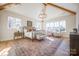 Spacious bedroom with a metal bed frame and large windows at 1214 S Kings Dr # A, Charlotte, NC 28207