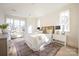 Bright bedroom with window seat and large windows at 1214 S Kings Dr # A, Charlotte, NC 28207