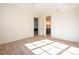 Spacious bedroom with hardwood floors and en-suite bathroom at 1214 S Kings Dr # A, Charlotte, NC 28207