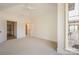Bright bedroom with ceiling fan and large windows at 1214 S Kings Dr # A, Charlotte, NC 28207