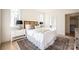 Charming bedroom with a white bed and built-in shelving at 1214 S Kings Dr # A, Charlotte, NC 28207