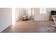 A dining area featuring a round table, three chairs, hardwood floors and natural light at 1214 S Kings Dr # A, Charlotte, NC 28207
