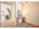 Bright entryway with hardwood floors, showcasing a staircase at 1214 S Kings Dr # A, Charlotte, NC 28207