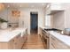 Elegant kitchen with a large island, modern appliances, custom cabinets, and open layout at 1214 S Kings Dr # A, Charlotte, NC 28207