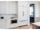 Modern kitchen with white cabinets, stainless steel appliances, and beautiful countertops at 1214 S Kings Dr # A, Charlotte, NC 28207