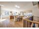 Open concept living room, kitchen, and dining area filled with light and modern finishes at 1214 S Kings Dr # A, Charlotte, NC 28207