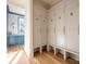 Bright mudroom with built-in lockers and blue cabinetry at 1214 S Kings Dr # A, Charlotte, NC 28207