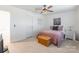 Relaxing bedroom showcasing a comfortable bed, ceiling fan and calm decor at 14450 Maritime Dr, Lancaster, SC 29720