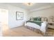 Bright bedroom featuring an inviting bed, a decorative painting, and soft, natural light at 14450 Maritime Dr, Lancaster, SC 29720
