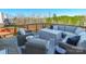 Outdoor deck featuring comfortable seating, perfect for enjoying the surrounding wooded views at 14450 Maritime Dr, Lancaster, SC 29720