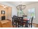 Dining area with hardwood floors, chandelier and view into entryway at 14450 Maritime Dr, Lancaster, SC 29720