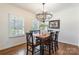 Elegant dining room featuring hardwood floors and a modern chandelier at 14450 Maritime Dr, Lancaster, SC 29720