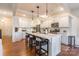 Modern kitchen featuring a central island with bar seating and stainless steel appliances at 14450 Maritime Dr, Lancaster, SC 29720