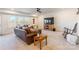 Cozy living room features leather seating, a wooden media center, and a rocking chair at 14450 Maritime Dr, Lancaster, SC 29720