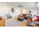 Spacious living room with a large leather couch and a charming rocking chair at 14450 Maritime Dr, Lancaster, SC 29720