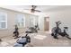Home workout room with weightlifting and exercise equipment and ample natural light at 14450 Maritime Dr, Lancaster, SC 29720