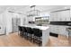 Spacious kitchen with a large island, stainless steel appliances, and modern lighting at 1565 Shinnville Rd, Cleveland, NC 27013