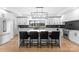 Open kitchen with a large island, barstool seating, and modern appliances at 1565 Shinnville Rd, Cleveland, NC 27013