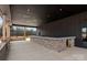 An amazing covered patio with a rustic bar counter and an open view of the outdoors at 1565 Shinnville Rd, Cleveland, NC 27013