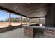 Beautiful patio boasts an outdoor bar and an expansive view of the surrounding landscape at 1565 Shinnville Rd, Cleveland, NC 27013