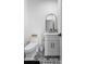 Charming powder room featuring black and white tile, modern toilet, and a plant at 1565 Shinnville Rd, Cleveland, NC 27013