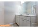 Bathroom with a large mirror, dual sinks, and quartz countertops, creating a modern and functional space at 1630 Troon Dr, Salisbury, NC 28144